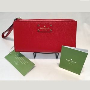 New with tags Kate spade Layton leather wallet.